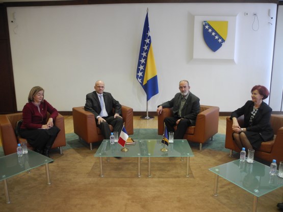 Members of the PABiH Delegation in the Parliamentary Assembly of the Francophonie Salko Sokolović and Mensura Beganović talk with a Deputy in the National Assembly of the Republic of France